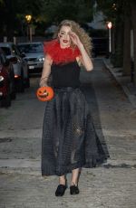 AMBER HEARD in a Quirky Clown Make-up and a Huge Red Ruff Collar Celebrates Halloween 10/31/2024