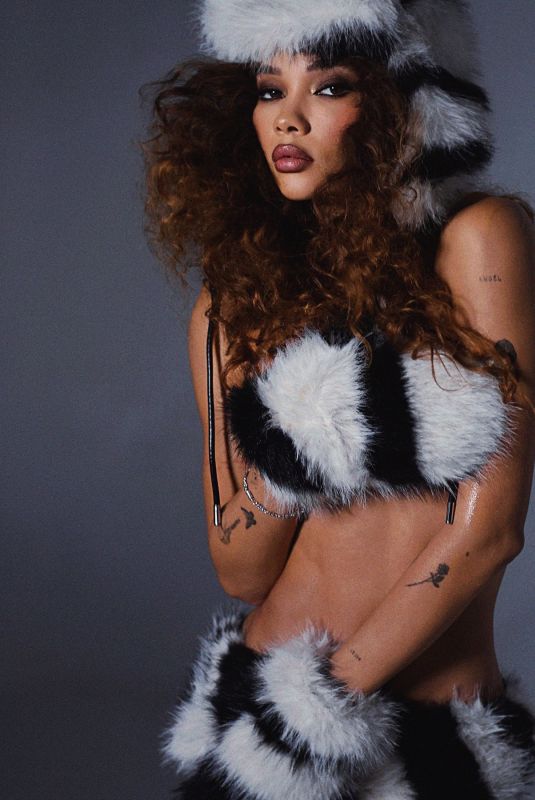 ASHLEY MOORE at a photoshoot, November 2024