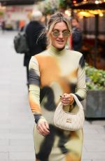 ASHLEY ROBERTS Leaves Heart Radio in a Tight Multicoloured Dress in London 11/18/2024