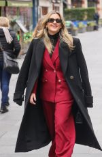ASHLEY ROIBERTS in a Red Trouser Suit Arrives at Heart Radio 11/21/2024
