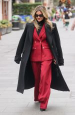 ASHLEY ROIBERTS in a Red Trouser Suit Arrives at Heart Radio 11/21/2024