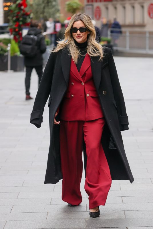ASHLEY ROIBERTS in a Red Trouser Suit Arrives at Heart Radio 11/21/2024