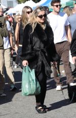 BEBE REXHA Shopping at Farmer
