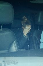 CARA DELEVINGNE Arrives at Leonardo DiCaprio