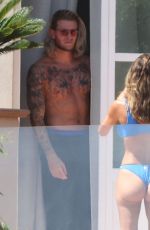 DILETTA LEOTTA and Loris Karius on a Terrace of Sicilian Resort 08/04/2024
