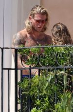 DILETTA LEOTTA and Loris Karius on a Terrace of Sicilian Resort 08/04/2024