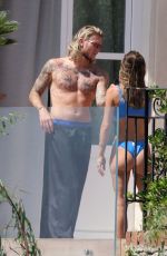 DILETTA LEOTTA and Loris Karius on a Terrace of Sicilian Resort 08/04/2024