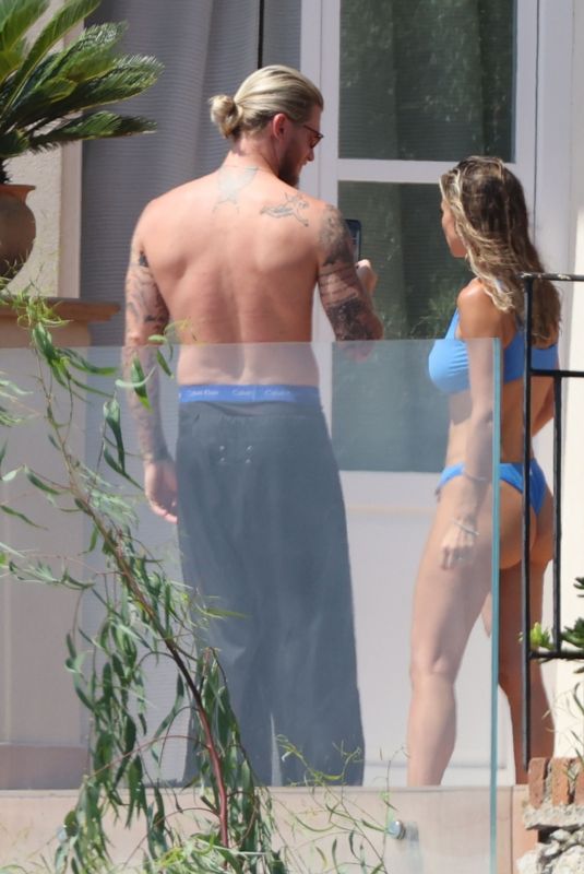 DILETTA LEOTTA and Loris Karius on a Terrace of Sicilian Resort 08/04/2024