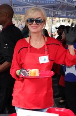 EILEEN DAVIDSON Serves Food to Homeless at LA Mission in Los Angeles 11/27/2024