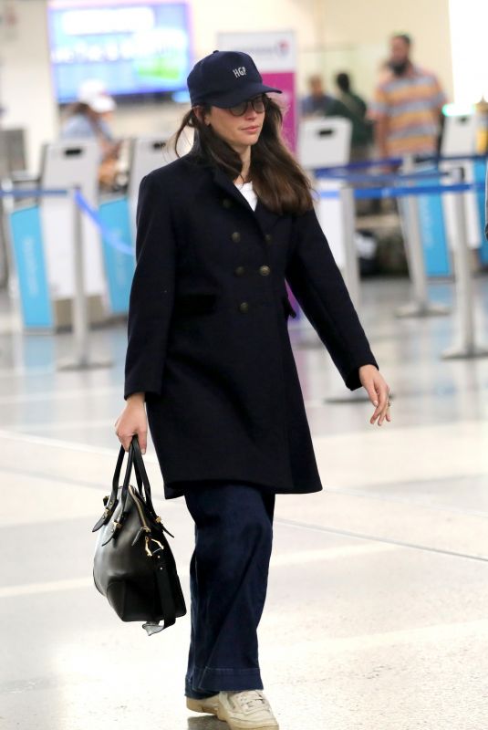 FELICITY JONES Arrives at Airport in Los Angeles 11/19/2024