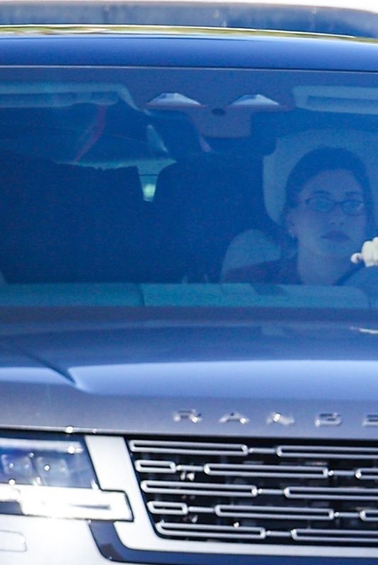 HAILEY BIEBER Keeps Busy with Her Phone while Stuck in LA Traffic 11/15/2024