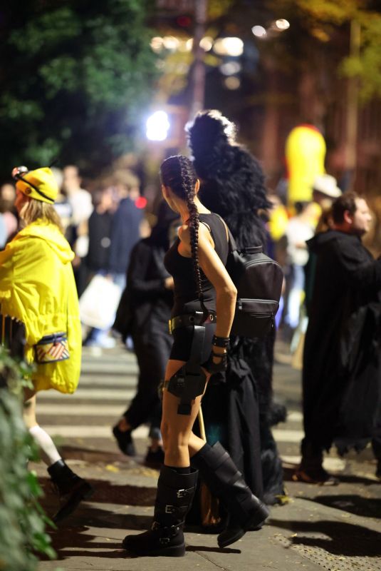 IRINA SHAYK Costumes up as Lara Croft While Trick-or-treating in New York 10/31/2024