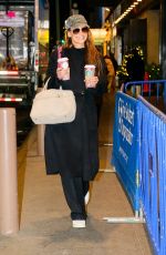 KATIE HOLMES Carries Two Coffees from Starbucks Out in New York City 11/26/2024