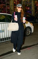 KATIE HOLMES Carries Two Coffees from Starbucks Out in New York City 11/26/2024