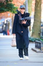 KATIE HOLMES Vraves the Cold During a Day Out in New York 11/30/2024