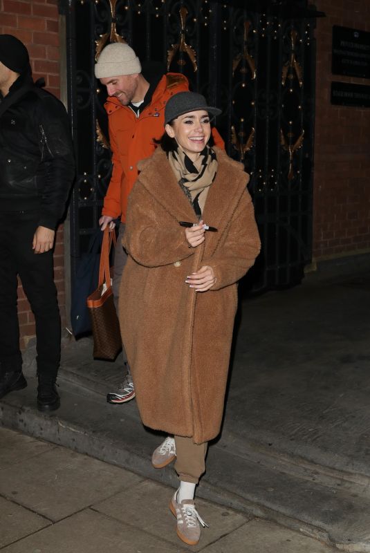 LILY COLLINS Leaves Duke of York Theatre in London 11/21/2024