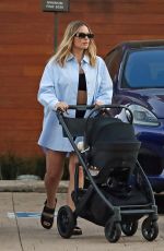 MARGOT ROBBIE Leaves a Restaurant with Her Baby in Los Angeles 11/09/2024