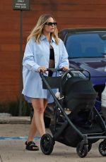 MARGOT ROBBIE Leaves a Restaurant with Her Baby in Los Angeles 11/09/2024