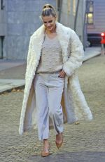 MICHELLE HUNZIKER Wearing a White Fake Fur Coat Out in Milan 11/28/2024