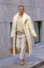 MICHELLE HUNZIKER Wearing a White Fake Fur Coat Out in Milan 11/28/2024