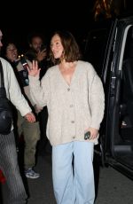 MINKA KELLY on the Set of Netflix Christmas Movie Champagne Problems in Paris 11/15/2024