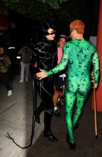 NINA DOBREV and Shaun White as Batman