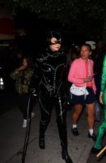 NINA DOBREV and Shaun White as Batman