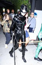 NINA DOBREV and Shaun White as Batman