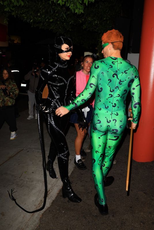 NINA DOBREV and Shaun White as Batman
