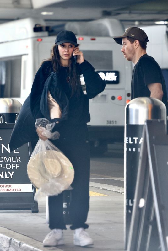 NINA DOBREV and Shaun White Leaves LAX in Los Angeles 11/02/2024