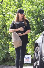 Pregnant GISELE BUNDCHEN Carrying a Portable Grill to to Her Car in Miami 11/05/2024