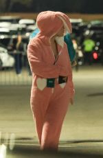 SELENA GOMEZ in a Pink Bunny Onesie Arrives at Sabrina Carpenter
