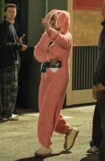 SELENA GOMEZ in a Pink Bunny Onesie Arrives at Sabrina Carpenter