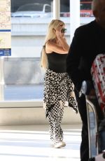 TORI SPELLING Arrives at LAX Airport in Los Angeles 11/06/2024