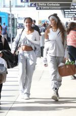 WINNIE HARLOW with a Friend Arrives at LAX Airport in Los Angeles 11/04/2024