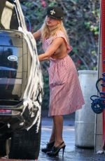 ADDISON RAE Washes Her Car in Los Angeles 12/01/2024