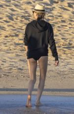 CHARLIZE THERON in Swimsuit at a Beach on Vacation in Mexico 12/28/2024