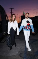 CHRISSY TEIGEN and John Legend Arrives at Flamingo Estate x Kismet Adoption in Los Angeles 12/14/2024