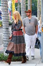 CLAUDIA SCHIFFER Enjoys Family Shopping Day in Beverly Hills 12/11/2024
