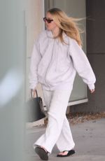 DAKOTA FANNING at Crane Hair Salon in West Hollywood 12/23/2024