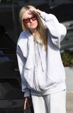 DAKOTA FANNING at Crane Hair Salon in West Hollywood 12/23/2024