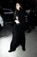 DEMI MOORE Arrives at The Substance Screening with Her Dog Pilaf 12/04/2024