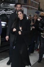 DEMI MOORE Arrives at The Substance Screening with Her Dog Pilaf 12/04/2024