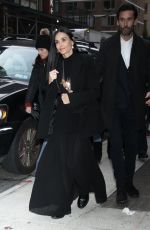 DEMI MOORE Arrives at The Substance Screening with Her Dog Pilaf 12/04/2024