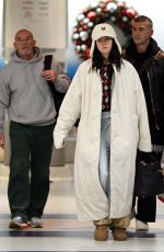 DUA LIPA Arrives at JFK Airport with Family in New York City 12/11/2024