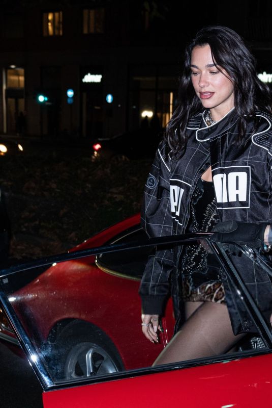 DUA LIPA Arrives at Puma Speedcat Launch Celebration Photocall in Milan 12/10/2024