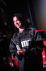 DUA LIPA Arrives at Puma Speedcat Launch Celebration Photocall in Milan 12/10/2024