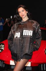 DUA LIPA Arrives at Puma Speedcat Launch Celebration Photocall in Milan 12/10/2024