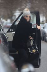ELIZABETH HURLEY Out with Her Son Damian in London 12/11/2024