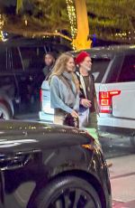 ELLE MACPHERSON and Doyle Bramhall II Out for Dinner at Nobu in Miami 12/02/2024